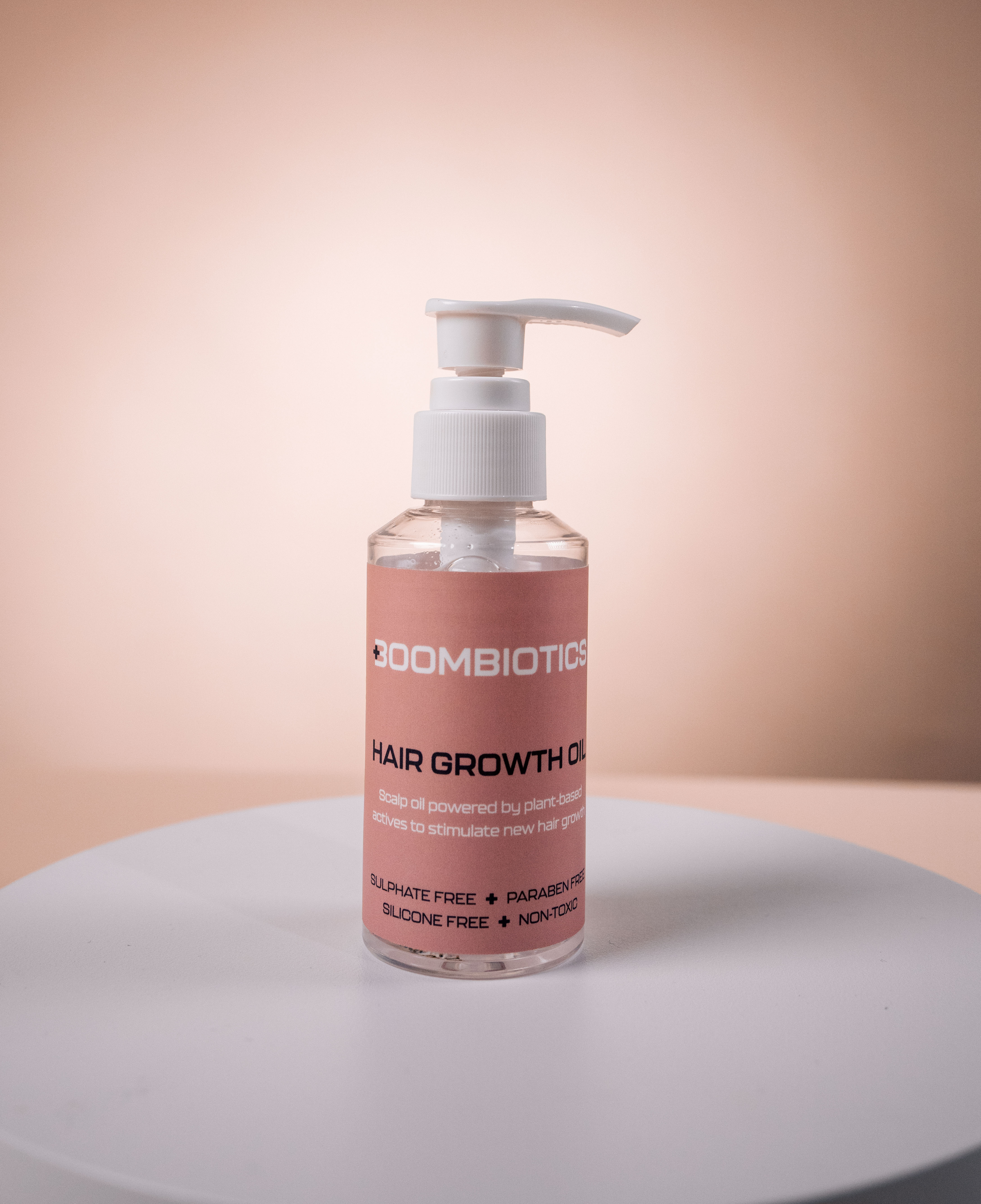 Boombiotics Hair Growth Oil XXML Stronger roots, softer ends, glowing results.